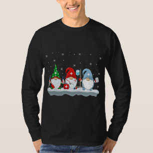 Camiseta Navidades divertidos de Santa Nurse Gnomes ilumina