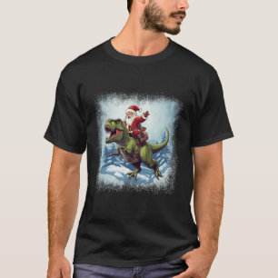 Camiseta Navidades divertidos de Santa Riding A Dinosaur T-