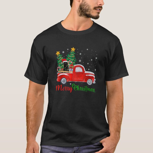 Camiseta Navidades gato negro montando camionetas rojas Nav (Anverso)
