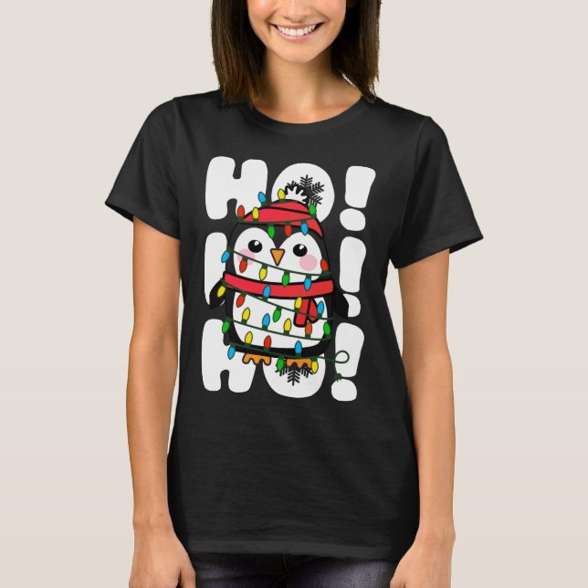 Camiseta Navidades Ho Ho Ho Ho iluminan el pingüino (Anverso)