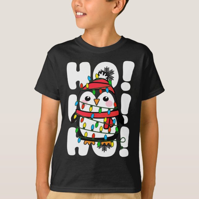 Camiseta Navidades Ho Ho Ho Ho iluminan el pingüino (Anverso)