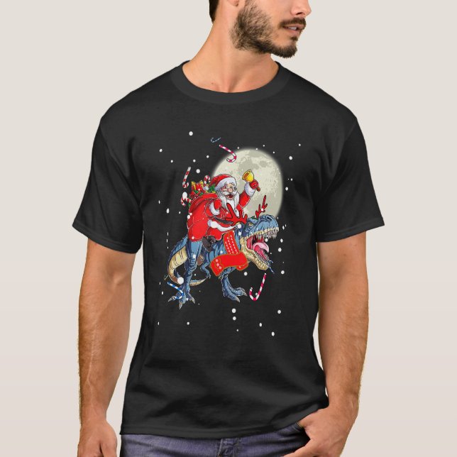 Camiseta Navidades Santa Claus montando dinosaurio para niñ (Anverso)