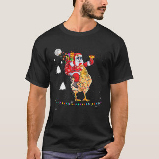 Camiseta Navidades Santa Claus montando luces de pollo Xmas