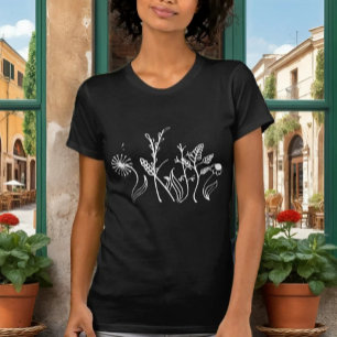 Camiseta negra elegante con delicadas flores de ga