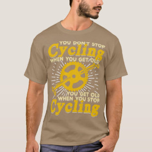 Camiseta No dejas de andar en bicicleta cuando envejeces