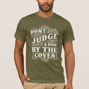 CAMISETA NO JUZGUES UN LIBRO POR SU CUBIERTA