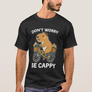 Camiseta No te preocupes por ser cappy Capybara en un bici