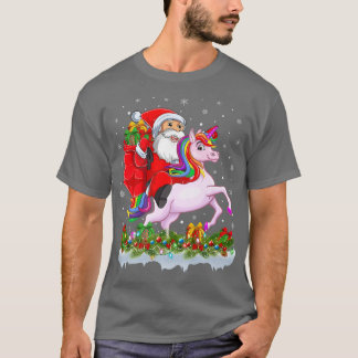 Camiseta Noche de luz divertida Papá Noel montando en casa 