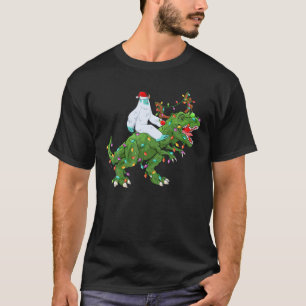 Camiseta Noche divertida enciende Santa Yeti Riding Dinosau