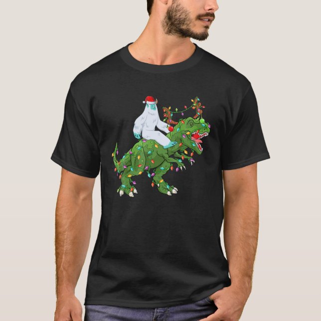 Camiseta Noche divertida enciende Santa Yeti Riding Dinosau (Anverso)