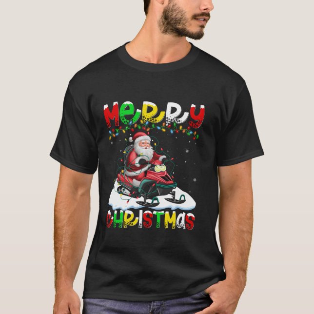 Camiseta Nochebuena alumbrando Santa Snowmobiling Feliz Nav (Anverso)