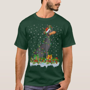 Camiseta Nochebuena de familia iluminando perro de Santa Do