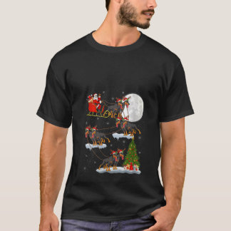 Camiseta Noches de Navidad iluminan divertida Santa Riding 