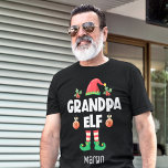 Camiseta Nombre del equipo de navidades que coinciden con l<br><div class="desc">Entra en el espíritu de las vacaciones con esta divertida camiseta del abuelo que es parte de una colección de ropa de elfo familiar que contiene regalos para cualquier miembro de la familia. Perfecto para cualquier reunión familiar de Navidades, esta camiseta tiene un lindo gorra elfo y piernas divertidas, con...</div>