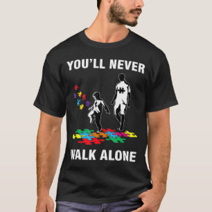 Camiseta Nunca pasearás solo puzzle pedazos autistas en gu