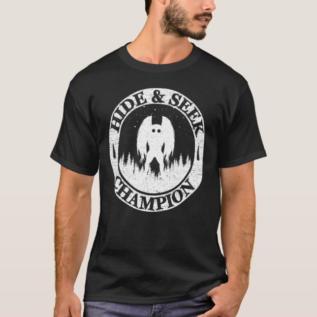 Camiseta Ocultar Y Buscar Al Campeón Mundial Mothman Crypti (Anverso)