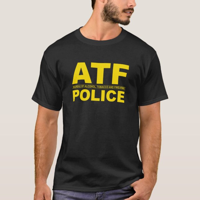 CAMISETA OFICINA DE POLICÍA DEL ATF SOBRE EL TABACO DE ALCO (Anverso)