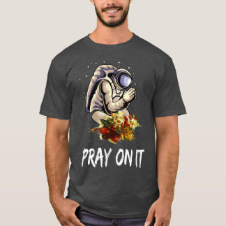 Camiseta Oración de astronautas -Spaceman reza flujo mundia