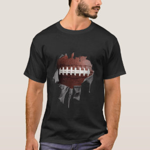 Camiseta oscura rasgada del fútbol