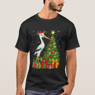 Camiseta Pájaro de cigüeña árbol de navidad iluminando pája