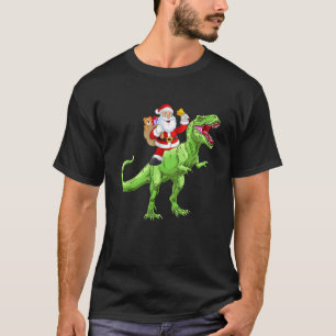 Camiseta Papá Noel lindo montando dinosaurio rex niños Navi