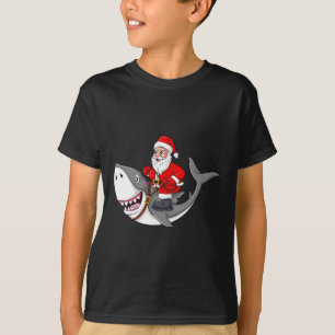 Camiseta Papá Noel viajando en Navidades de tiburones niños
