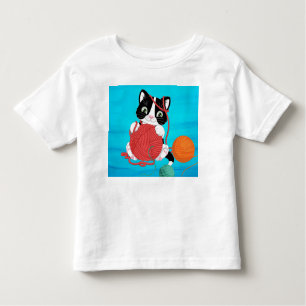 camiseta para niños con gatito jugando con hilo