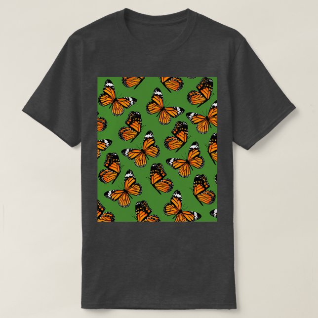 Camiseta Patrón de mariposas monarca naranja en verde (Diseño del anverso)