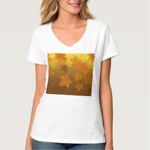 Camiseta Patrón otoñal con hojas de arce en caída y bokeh