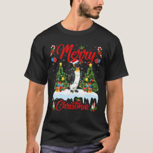 Camiseta Penguin Lover Xmas iluminando al pingüino