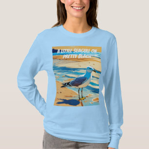Camiseta Pequeña gaviota en una playa (diseñada)