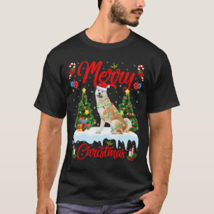 Camiseta Perro Akita enciende árbol de navidad Navidades de