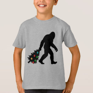Camiseta Pie Grande arrastrando árbol de Navidad