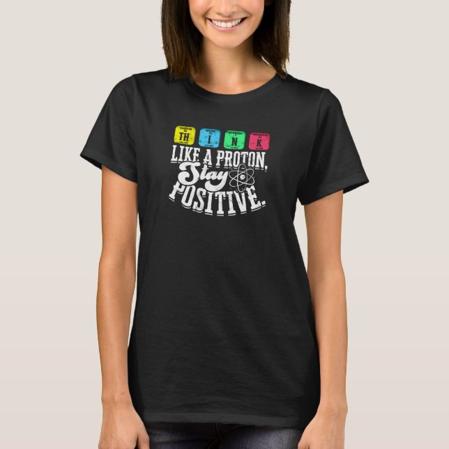 Camiseta Piensa como un protón Mantén una actitud positiva  (Anverso)