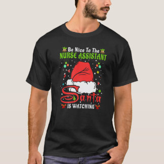 Camiseta Pijama Navideño de Santa Sé Amable con la Auxiliar