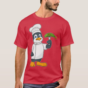 Camiseta Pingüino cocinado con delantal de cocina de pescad