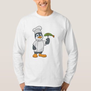Camiseta Pingüino cocinado con delantal de pescado y cocina
