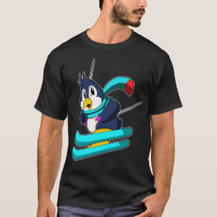 Camiseta Pingüino como esquiador con esquís