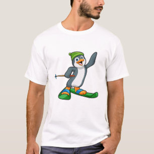 Camiseta Pingüino como esquiador con pista de esquí y gorro