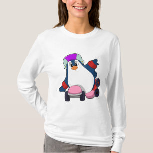 Camiseta Pingüino como patinador en línea con patines en lí