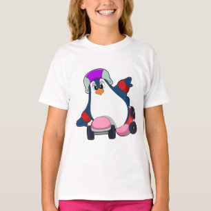 Camiseta Pingüino como patinador en línea con patines en lí