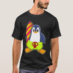 Camiseta Pingüino como surfista con tabla de surf