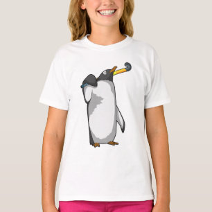 Camiseta Pingüino en hockey con bastón de hockey