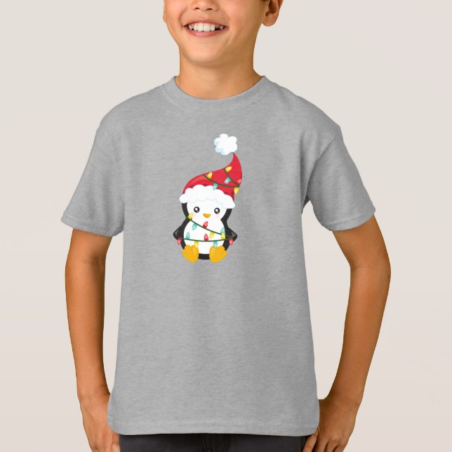 Camiseta Pingüino navidad, Santa Hat, Navidades alumbran (Anverso)