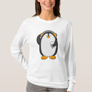 Camiseta Pingüino y teléfono móvil con auriculares