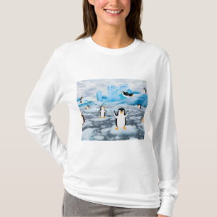 Camiseta pingüinos lindos en el hielo antártico