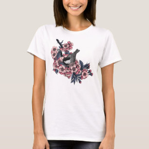 Camiseta Pollo en una rama de cerezo floreciente