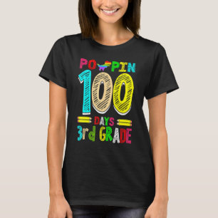 Camiseta Poppin 100 días escuela primaria de dinosaurio de 