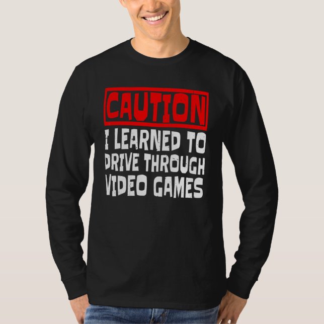 Camiseta Precaución Aprendí a Conducir a Través de Videojue (Anverso)