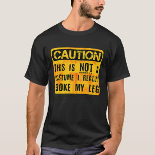 Camiseta Precaución Esto No Es Un Disfraz Pierna Rota Hallo